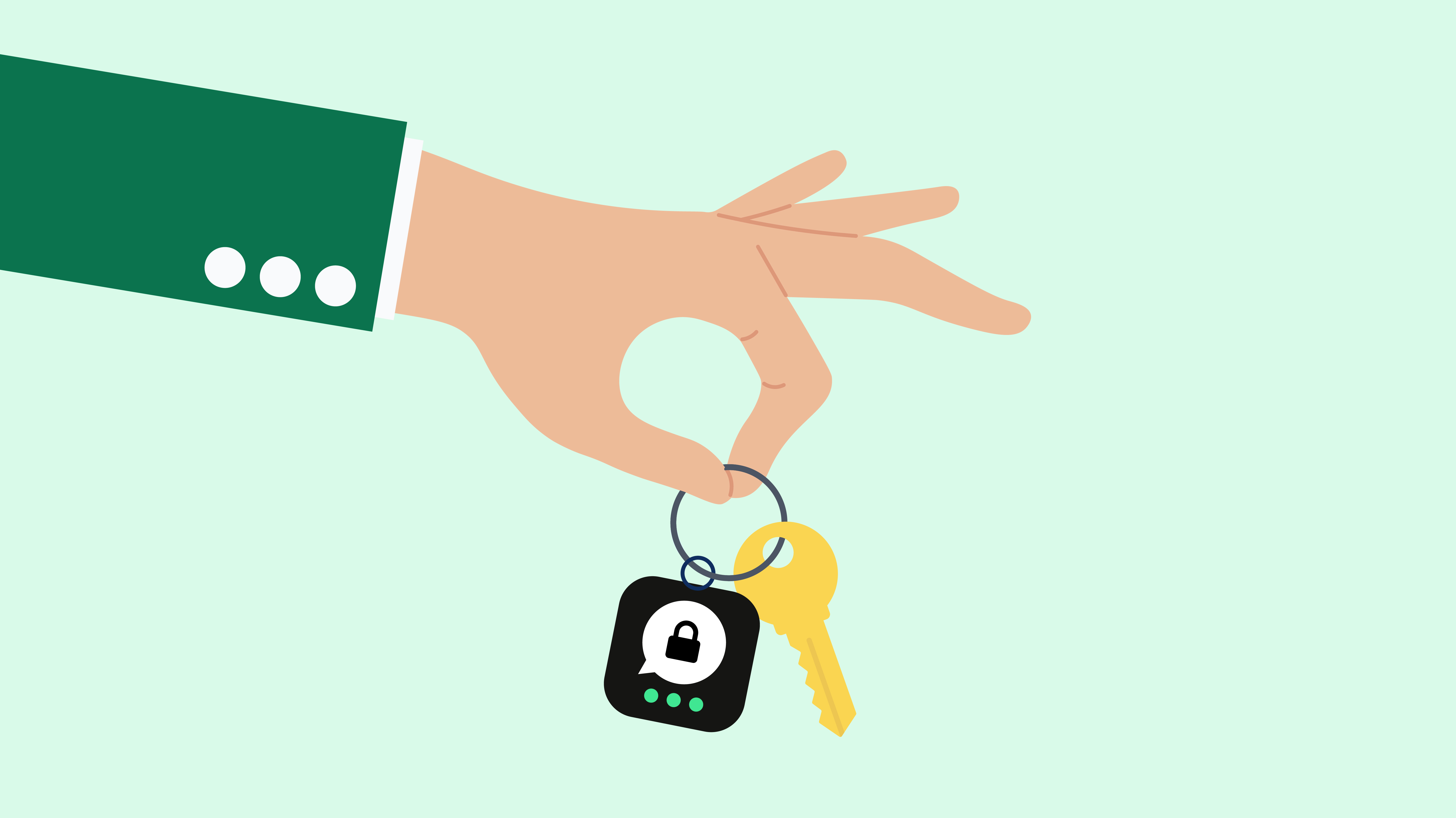 Hand holding a keyring with a key and the Threema icon.