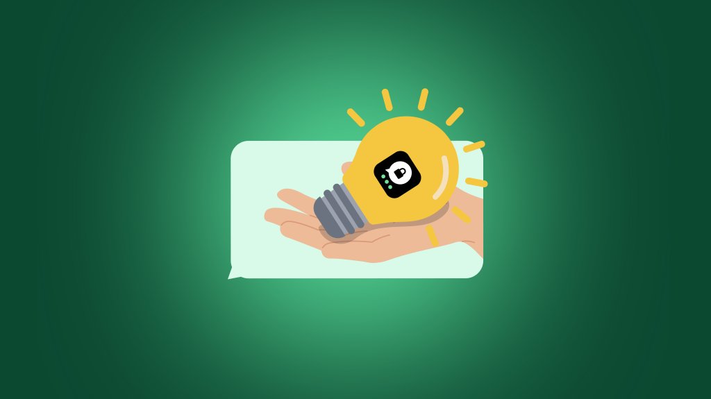 Chat bubble containing a hand holding a glowing light bulb.