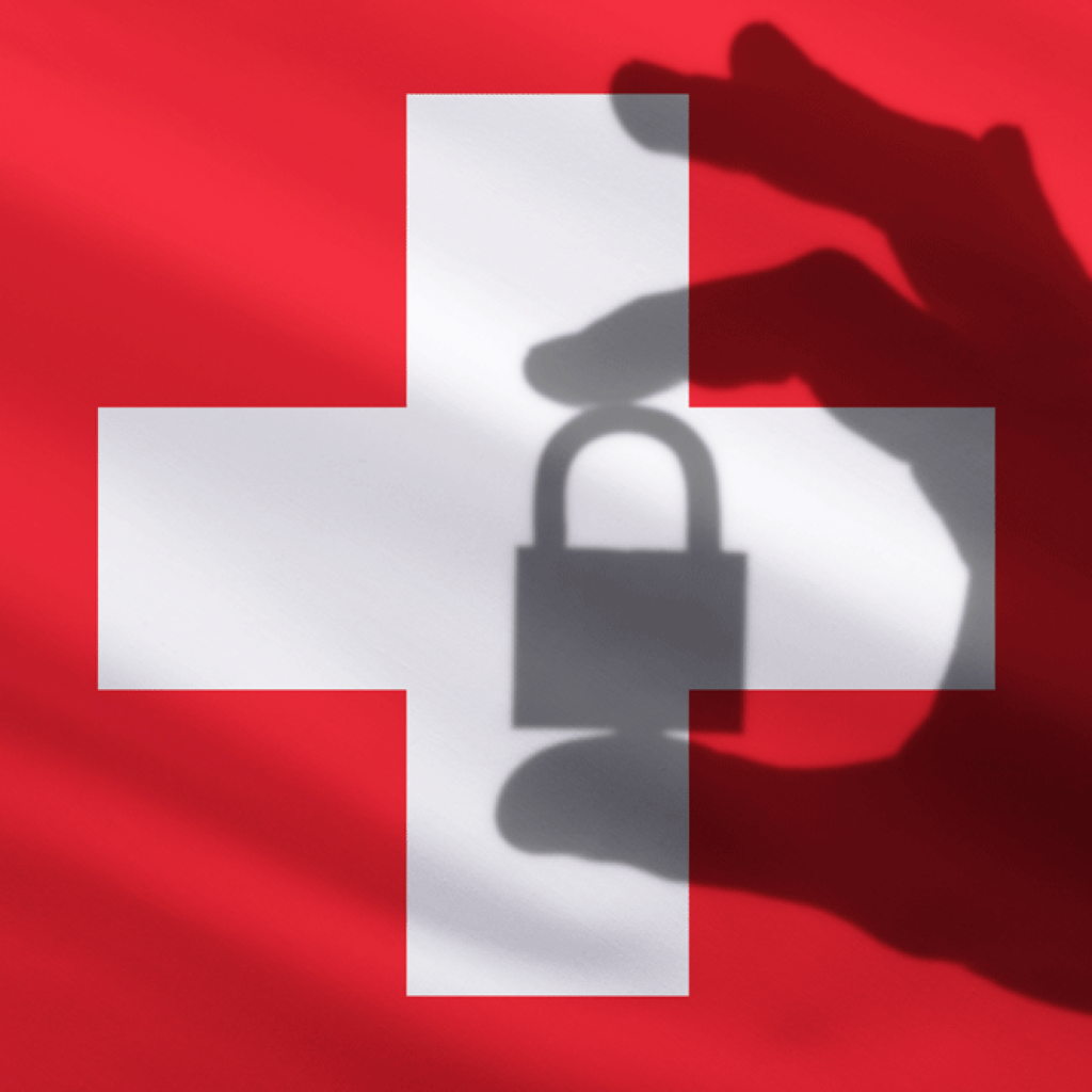 Schweizer Flagge, die von einem Schatten in Form einer Hand mit einem Schloss bedeckt ist.