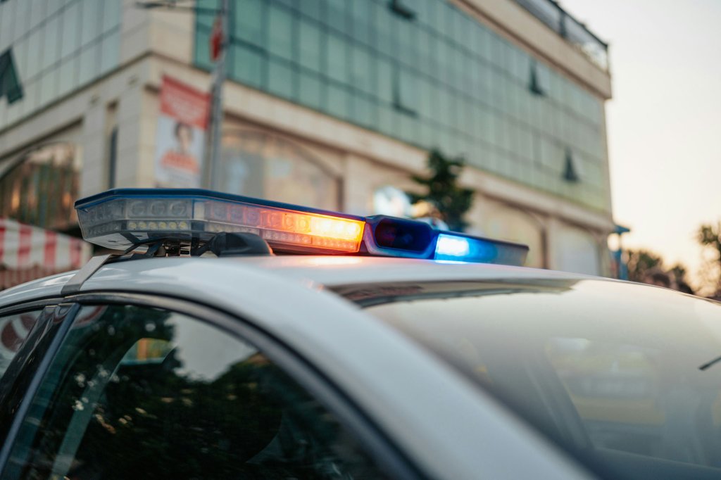 A car with flashing lights.